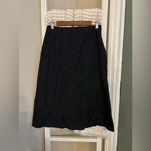 New Creation skirt. Black denim. Size Small. 30”